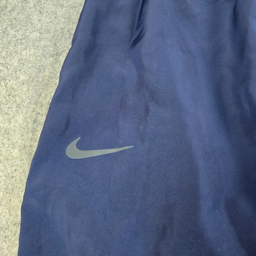 Nike‎ Track Pants Mens Medium Navy Blue Swoosh Logo Cuffed Joggers Sportswear